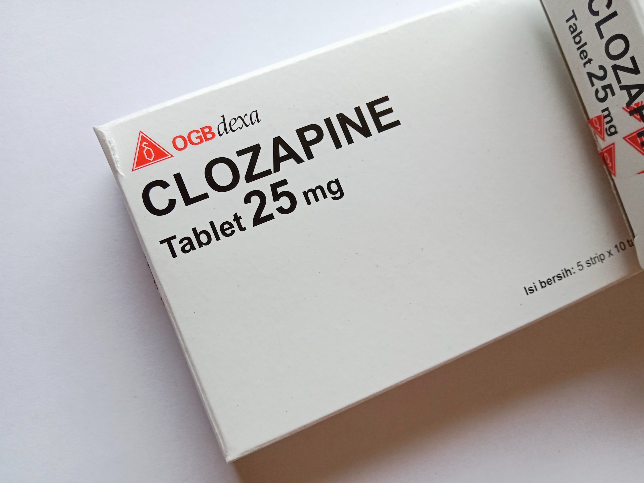 Close-up image of a package containing Clozapine tablets, highlighting advocacy initiatives and resources dedicated to enhancing accessibility to this crucial treatment for individuals with treatment-resistant schizophrenia